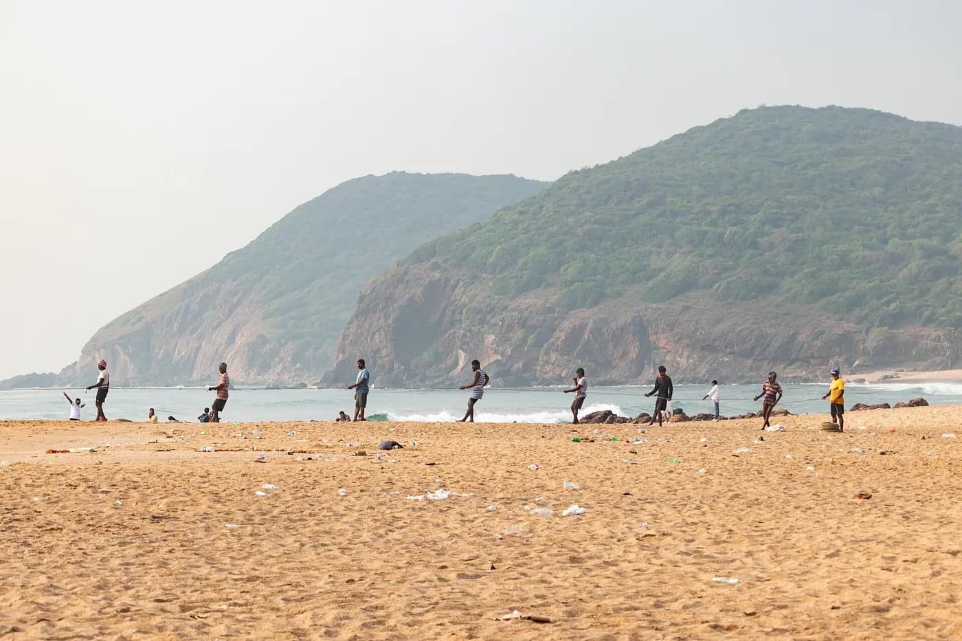 Fishermen hauling nets at Yarada Beach