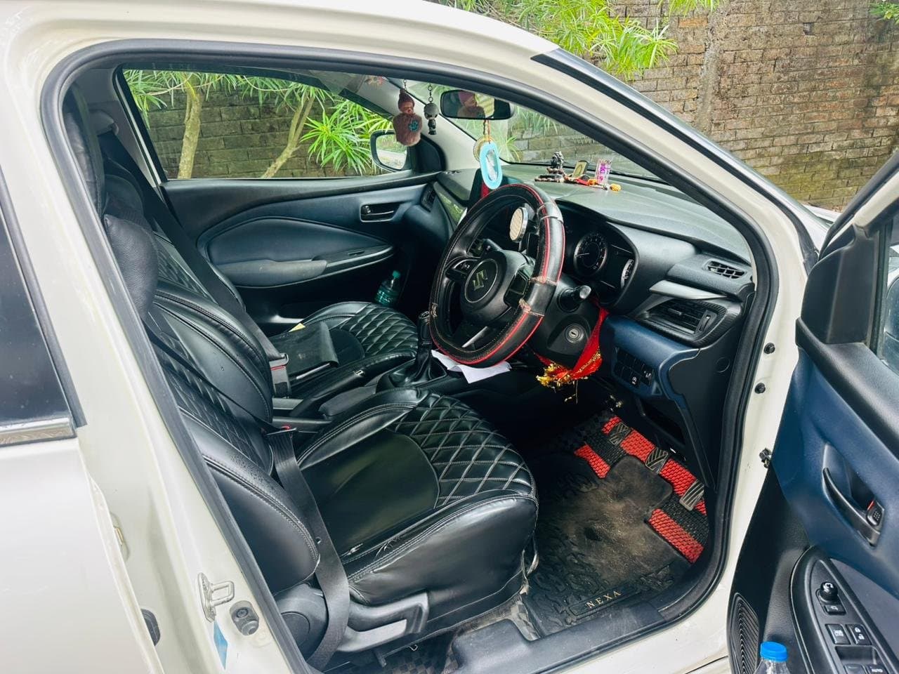 Maruti Suzuki Baleno Delta 2022 available for self-drive car rental in Gandhi Nagar on Hire N Ride