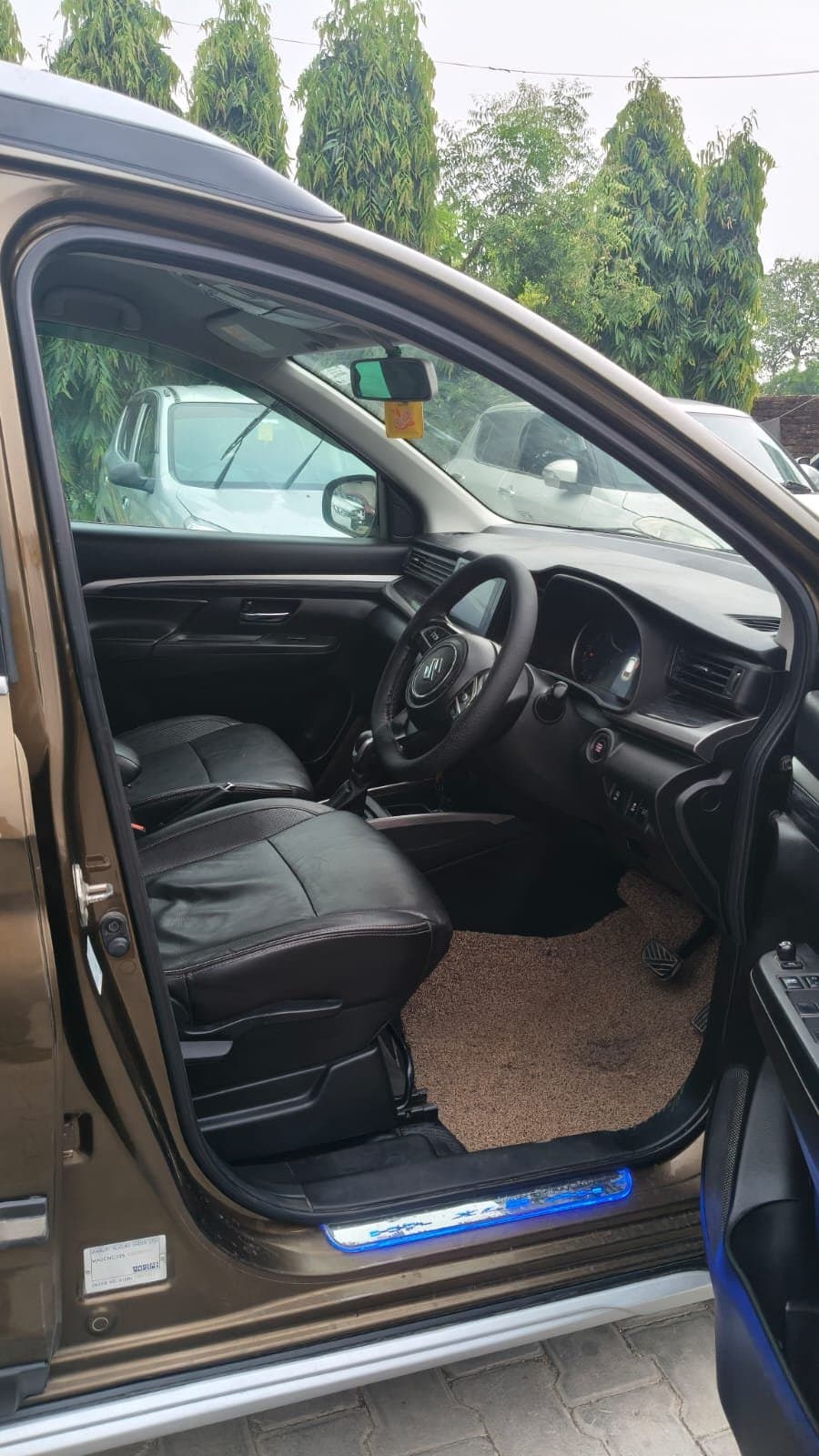 Maruti Suzuki Xl6 Smart Hybrid At Alpha 2019 available for self-drive car rental in Varanasi on Hire N Ride